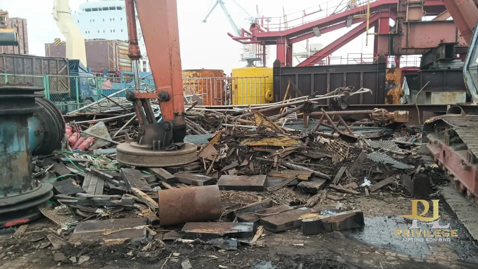 Factory scrap metal collection and dismantling at Masai industrial site